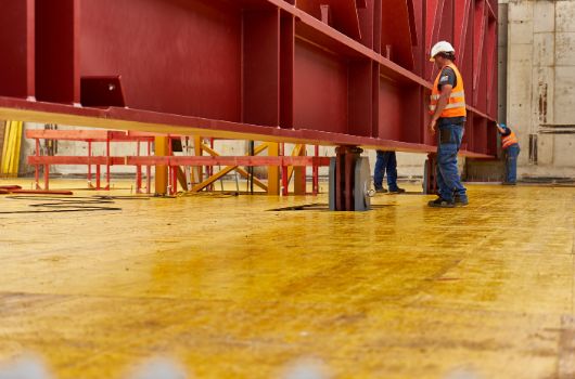 Endpositionierung des Tägers