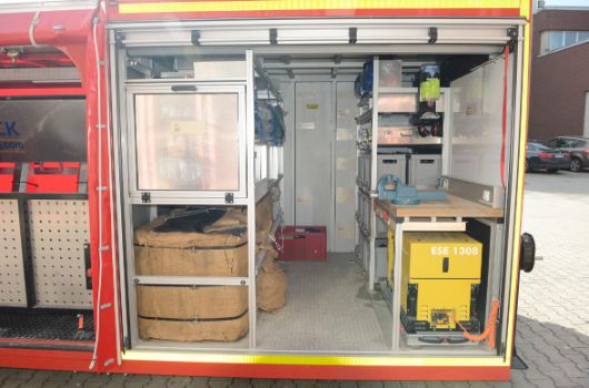 Abrollbehälter Sandsack