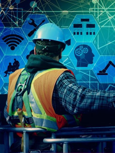 Techniker steht vor einer digitalen wand mit verschiednenen Icons